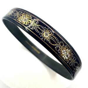 Michaela Frey black 24kt gold inlay white floral ribbons bows bangle bracelet